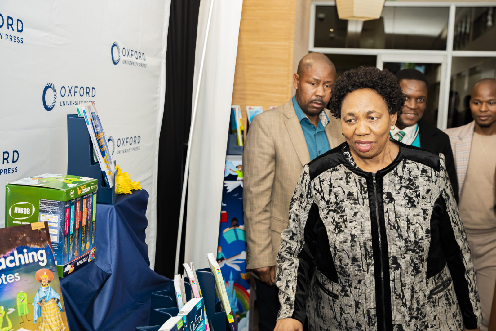 South African Minister of Basic Education Angie Motshekga looks at some of the books distributed for the Road to Literacy Campaign
